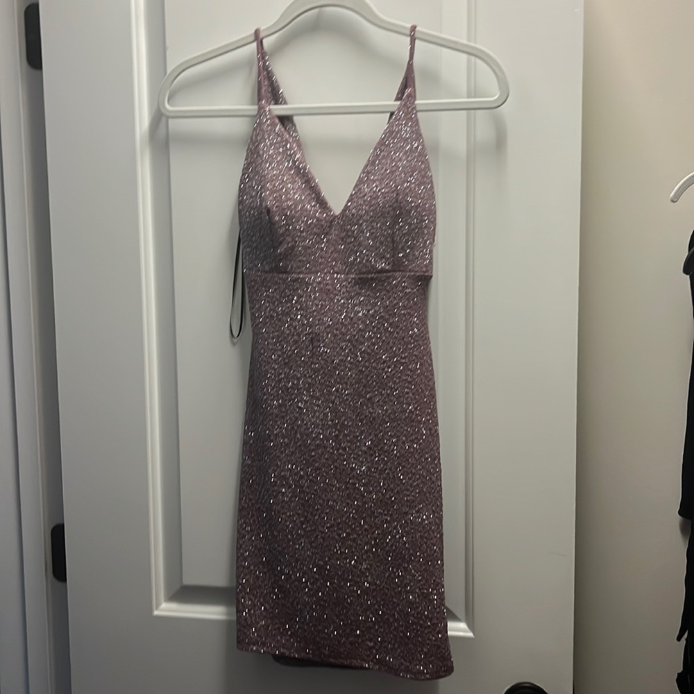 Party dress, very sparkly and flattering droopy back